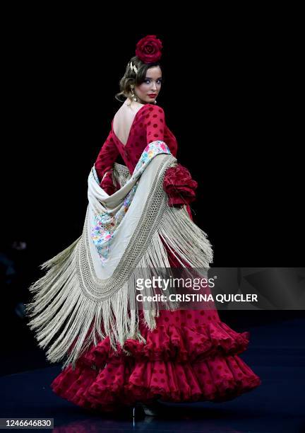 Model presents a creation by Maricruz Montecarlo during the Simof 2023 in Sevilla on January 29, 2023.