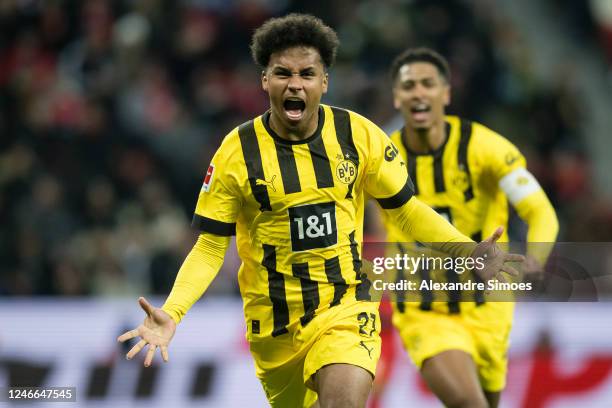Karim Adeyemi of Borussia Dortmund is celebrating his goal during the Bundesliga match between Bayer 04 Leverkusen and Borussia Dortmund at BayArena...