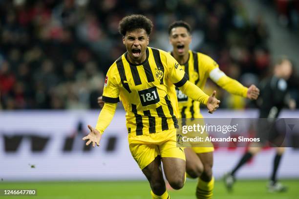 Karim Adeyemi of Borussia Dortmund is celebrating his goal during the Bundesliga match between Bayer 04 Leverkusen and Borussia Dortmund at BayArena...