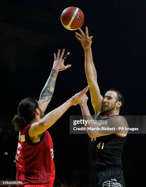 London Lions' Kosta Koufos shoots over Leicester Riders' Aaron Menzies during the British Basketball Cup Final match at the Utilita Arena Birmingham....