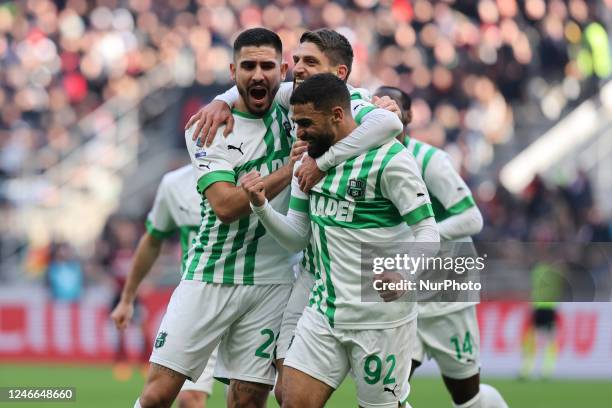 Gregoire Defrel of US Sassuolo celebrates with his teammates after scoring a goal during Serie A 2022/23 football match between AC Milan and US...