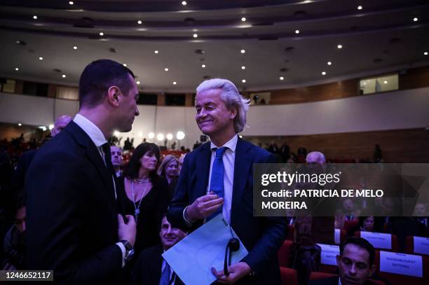 The president of Partij voor de Vrijheid - PVV Duth far-right party, Geert Wilders talks with Jordan Bardella, president of French far-right party...