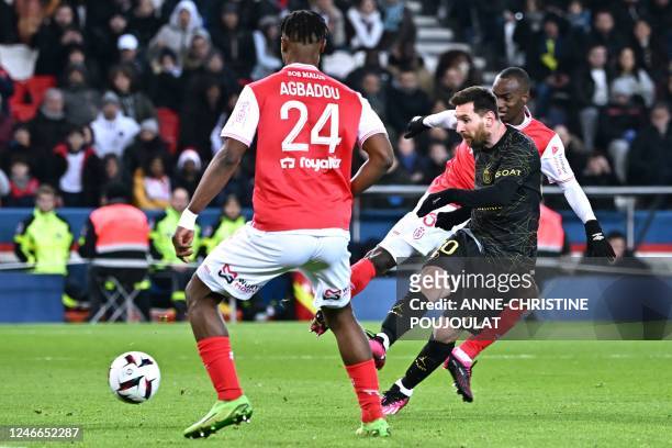 Paris Saint-Germain's Argentine forward Lionel Messi shoots and misses a goal opportunity during the French L1 football match between Paris...