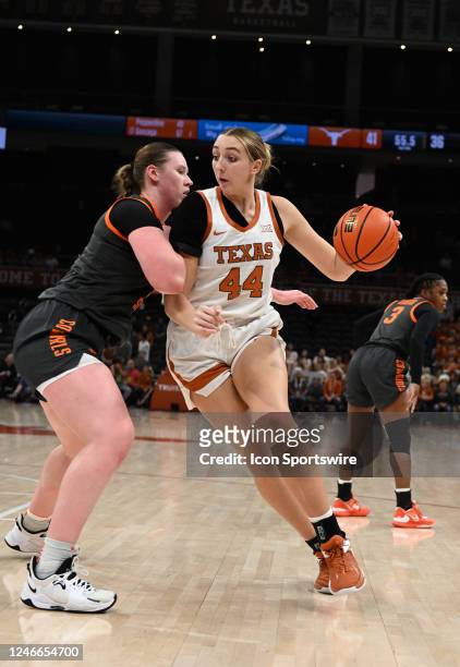 Texas Longhorns center Taylor Jones is defended by Oklahoma State Cowgirls center Kassidy De Lapp during the game featuring the Oklahoma State...