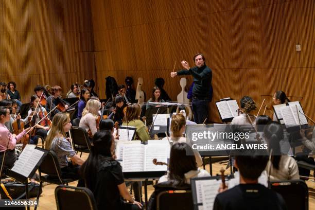 Music director Michael Repper conducts the New York Youth Symphony during a rehearsal on January 15, 2023 in New York City. - When the New York Youth...