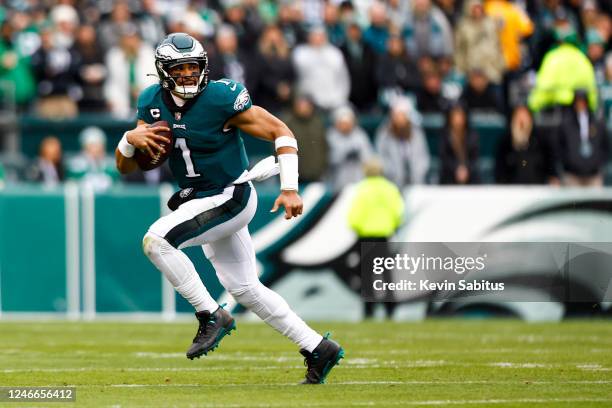 Jalen Hurts of the Philadelphia Eagles carries the ball during the first quarter of the NFC Championship NFL football game against the San Francisco...