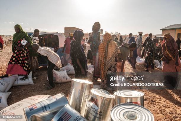 Internally displaced people participate in a food distribution at Berley Camp, 20 kilometres from the city of Gode, Ethiopia, on January 10, 2023. -...