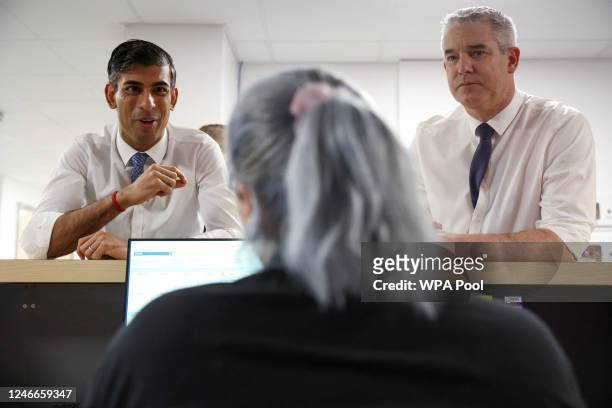 British Prime Minister Rishi Sunak speaks to staff member during a visit to the University Hospital of North Tees along with Health Secretary Steve...