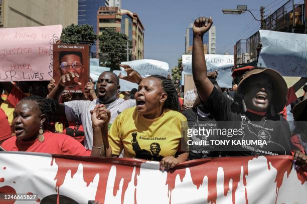 Members of various Human Rights Defender groups hold a protest against the brutal killing of renowned human rights lawyer, Thulani Maseko at his home...