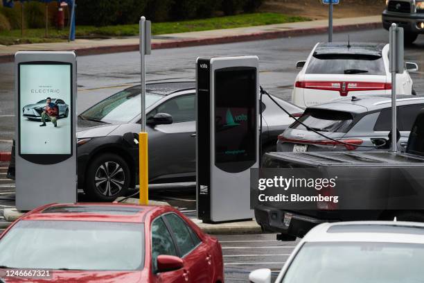 Volta electric vehicle chargers at a shopping center in Escondido, California, US, on Sunday, Jan. 29, 2023. Shell Plc agreed to buy US...