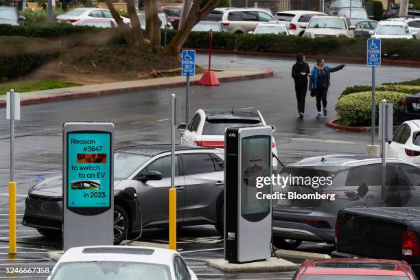 Volta electric vehicle chargers at a shopping center in Escondido, California, US, on Sunday, Jan. 29, 2023. Shell Plc agreed to buy US...