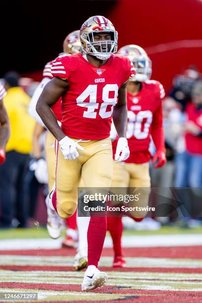 San Francisco 49ers linebacker Oren Burks celebrates an interception during the NFL NFC Divisional Playoff game between the Dallas Cowboys and San...