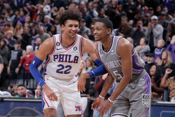 Matisse Thybulle of the Philadelphia 76ers and DeAaron Fox of the Sacramento Kings talk during the game on January 21, 2023 at Golden 1 Center in...