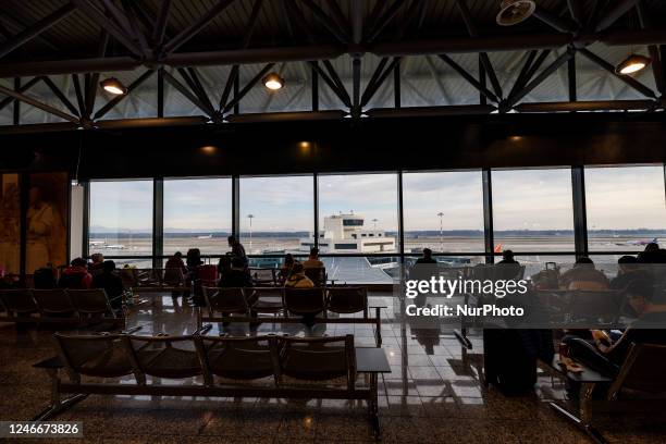 People at Milan Malpensa Airport, in Milan, Italy, on January 22, 2023.