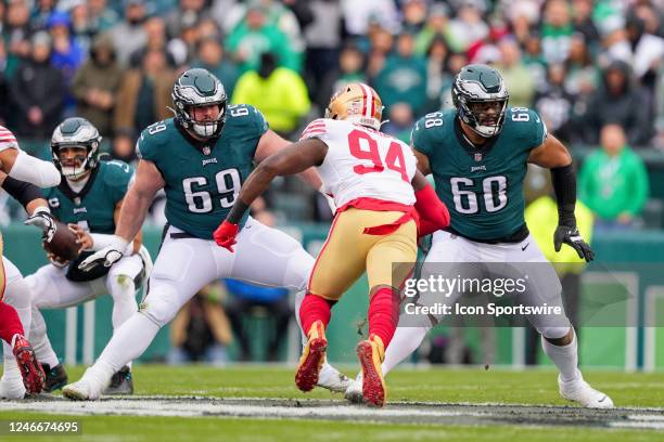 Philadelphia Eagles offensive tackle Jordan Mailata and Philadelphia Eagles center Landon Dickerson set up to block San Francisco 49ers defensive end...