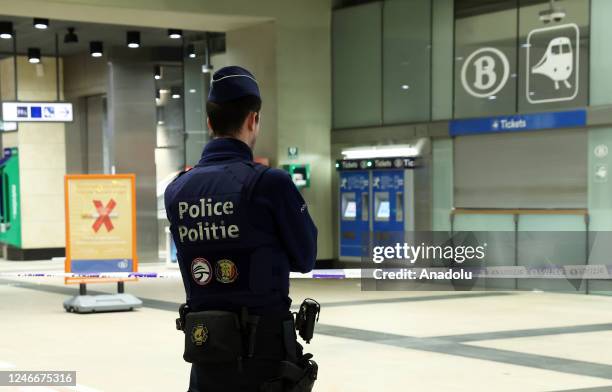 Police take measures at the metro station at Schuman Square, where European institutions are also located, after a knife attack in the Belgian...