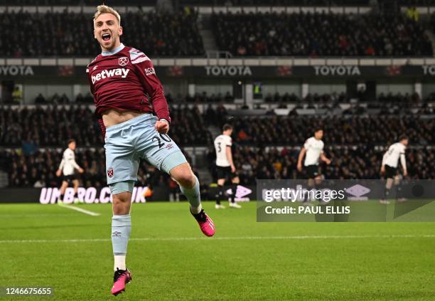 West Ham United's English striker Jarrod Bowen celebrates scoring the opening goal during the English FA Cup fourth round football match between...