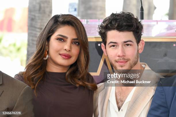 Priyanka Chopra Jonas and Nick Jonas at the star ceremony where the Jonas Brothers are honored with a star on the Hollywood Walk of Fame on January...