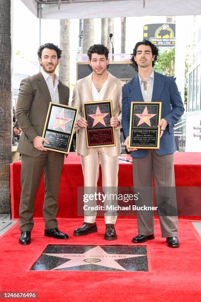 Kevin Jonas, Nick Jonas and Joe Jonas at the star ceremony where the Jonas Brothers are honored with a star on the Hollywood Walk of Fame on January...