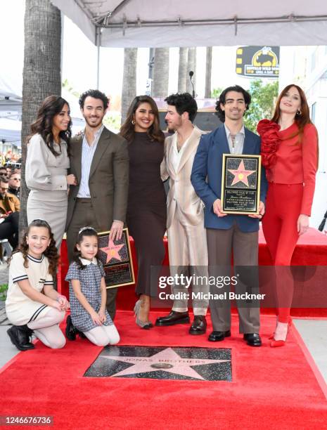 Danielle Jonas, Kevin Jonas, Priyanka Chopra, Nick Jonas, Joe Jonas, Sophie Turner, and Alena Rose Jonas and Valentina Angelina Jonas at the star...