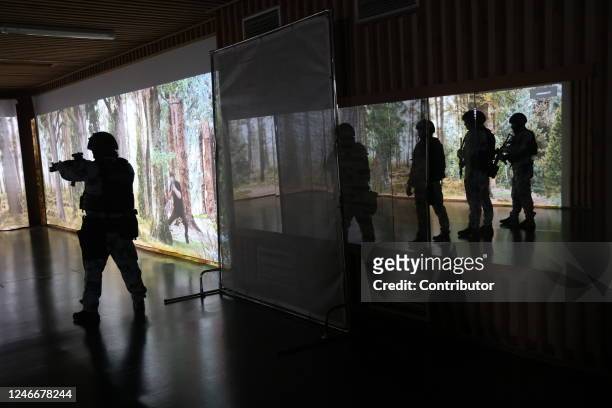 Officers with the OMON combat unit train at a new shooting range at their base January 30, 2023 in Podolsk, outside of Moscow, Russia. Special police...