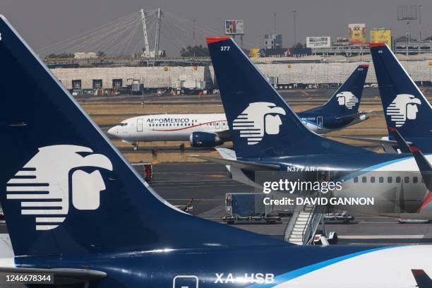Jets of Mexican flag carrier airline Aeromexico are parked at Mexico City's Benito Juarez International Airport on January 30, 2023.