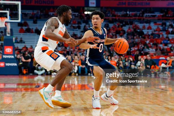 Virginia Cavaliers Guard Kihei Clark dribbles the ball against Syracuse Orange Guard Symir Torrence during the first half of the College Basketball...