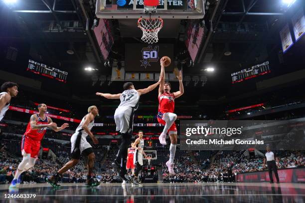 Deni Avdija of the Washington Wizards drives to the basket during the game against the San Antonio Spurs on January 30, 2023 at the AT&T Center in...