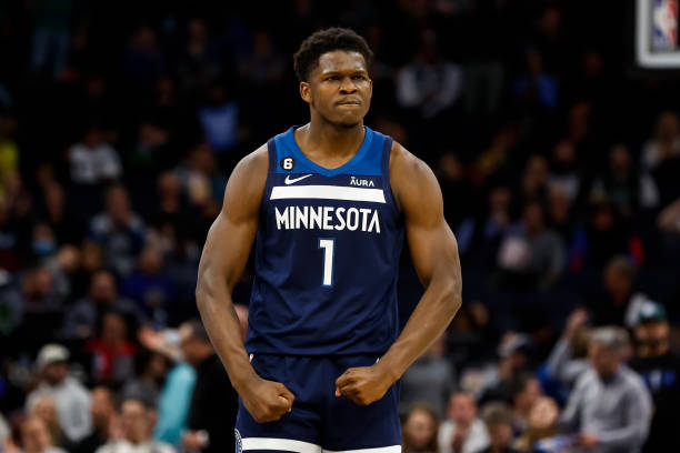 Anthony Edwards of the Minnesota Timberwolves reacts to teammate Rudy Gobert drawing a foul against the Sacramento Kings in the third quarter at...