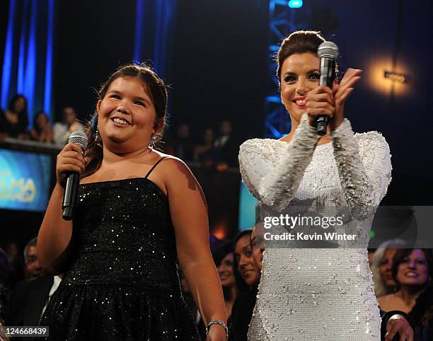 Actresses Madison De La Garza and Eva Longoria in the audience during the 2011 NCLR ALMA Awards held at Santa Monica Civic Auditorium on September...