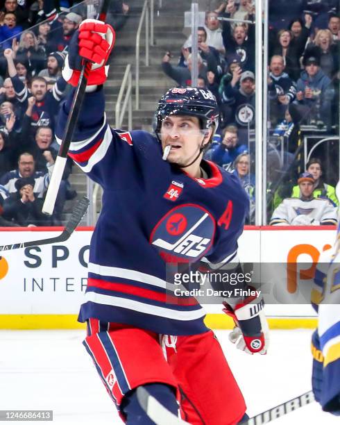 Mark Scheifele of the Winnipeg Jets celebrates his third period goal against the St. Louis Blues at the Canada Life Centre on January 30, 2023 in...