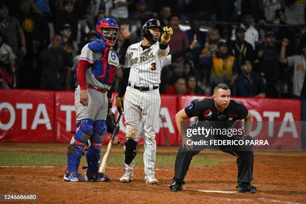 Harold Castro of Leones del Caracas reacts after hitting a home run against Tiburones de la Guaira during the Game Six of the Venezuelan Baseball...