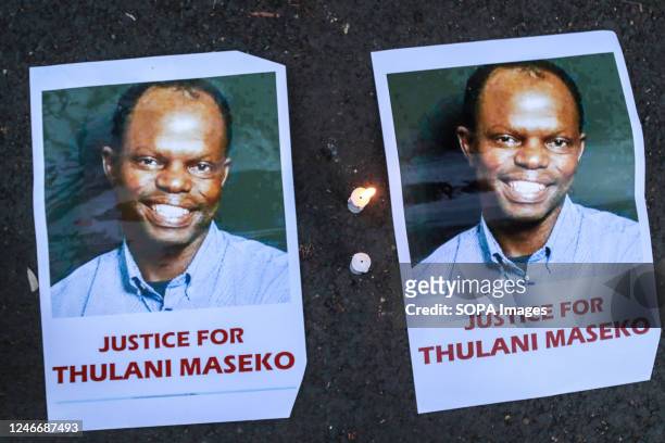 Posters with the image of the assassinated Eswatini, formerly Swaziland, Human Rights Lawyer Thulani Maseko are seen during a demonstration to pay...