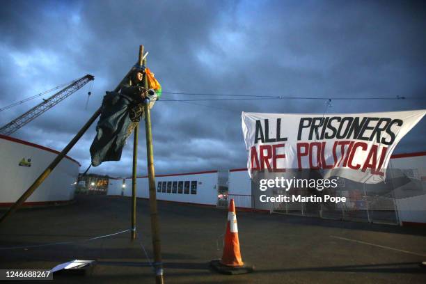 Protester sits on top of a tripod to block access to construction workers on January 31, 2023 in Full Sutton, United Kingdom. Activists say they are...