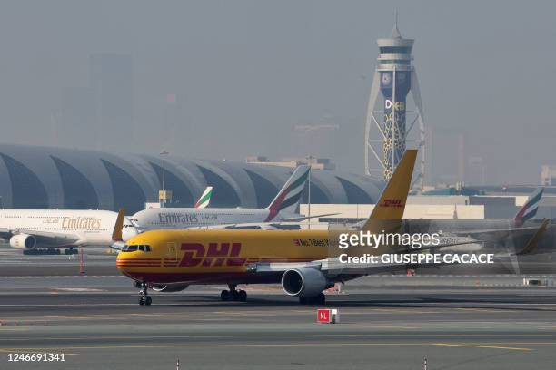 Aeroplane is pictured at the tarmac of Dubai International Airport in Dubai, on January 30, 2023.