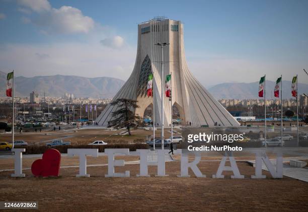 An urban statue is seen next to the Azadi square in western Tehran, January 29, 2023. Since the Iranian Islamic Revolution triumphed forty-four years...