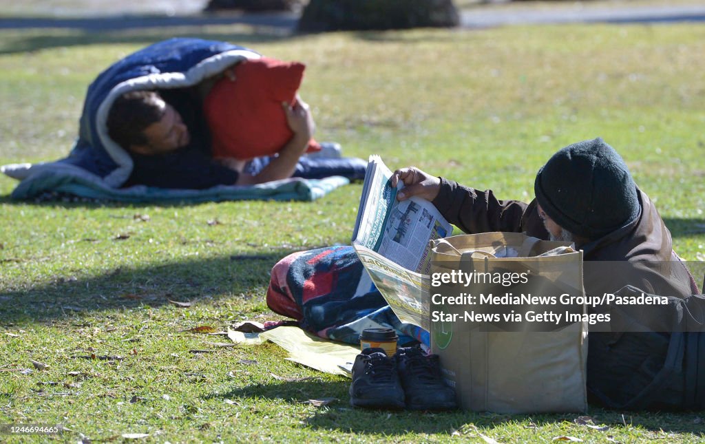 Homeless While Raining Homeless people camp out near Echo Park Lake in Los Angeles, CA News ...