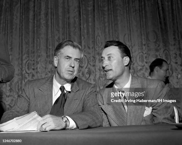 American politician, journalist, farmer and former Vice President Henry A. Wallace , sits with his running mate American politician, entertainer,...