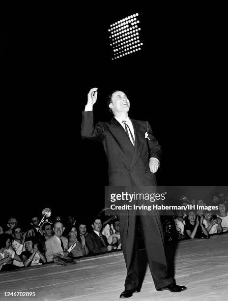 American politician, entertainer, businessman, and U.S. Senator from Idaho Glen H. Taylor , waves to the crowd during the Progressive Party...