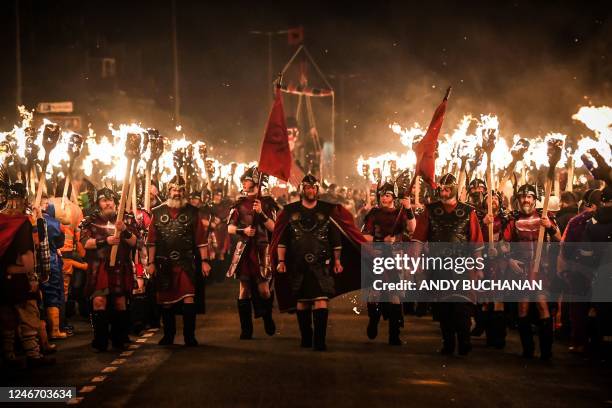 Participants take part in the Up Helly Aa festival parade through the streets of Lerwick, Shetland Islands on January 31, 2023. Up Helly Aa...