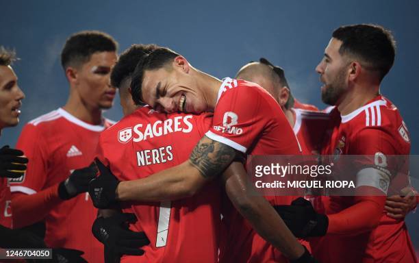 Benfica's Croatian forward Petar Musa celebrates with teammates after scoring a goal during the Portuguese league football match between FC Arouca...