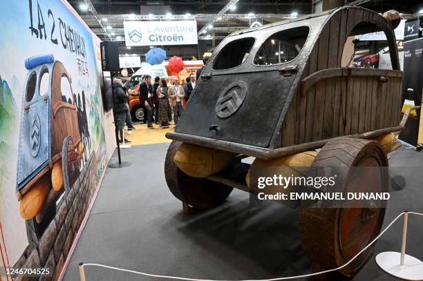 This photograph taken on January 31, 2023 shows a Citroen 2CV concept interpretation created for the latest French movie "Asterix and Obelix" during...