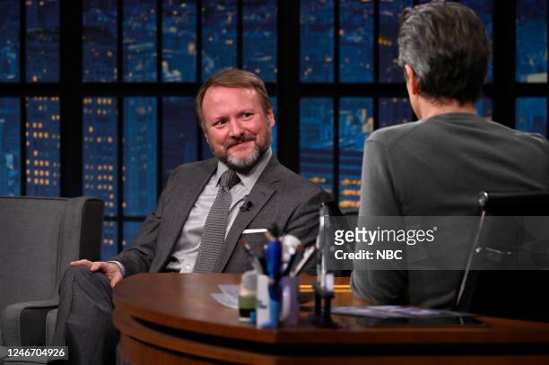 Episode 1386 -- Pictured: Filmmaker Rian Johnson during an interview with host Seth Meyers on January 31, 2023 --