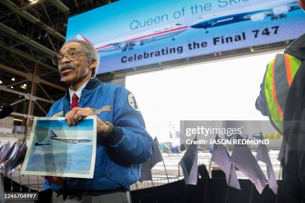 Retired Boeing employee Thomas Gray speaks to media as current and former Boeing employees, customers and invited guests celebrate the delivery of...