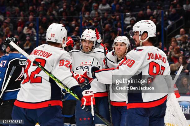 Trevor van Riemsdyk of the Washington Capitals celebrates with teammates after scoring a goal during the second period of a game against the Columbus...