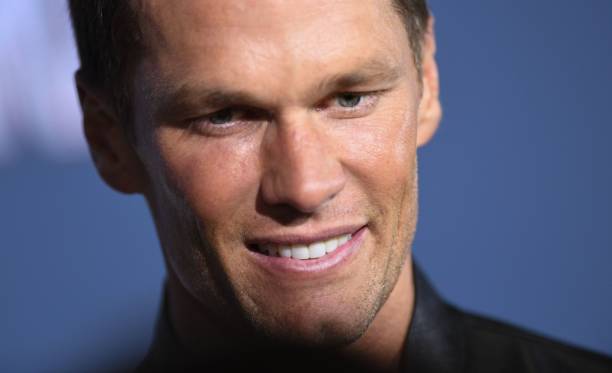Pro-football player Tom Brady arrives for the Los Angeles premiere screening of "80 For Brady" at the Regency Village Theatre in Los Angeles,...
