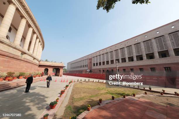 The current Parliament House, left, and the new parliament building under construction, in New Delhi, India, on Tuesday, Jan. 31, 2023. 2023. India...