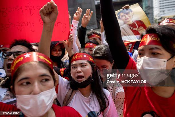 Protesters take part in a demonstration outside the Embassy of Myanmar in Bangkok on February 1 to mark the second anniversary of the coup in...