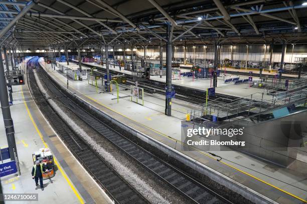 Near-empty platforms at Leeds railway station during joint strike action by train drivers, teachers, university staff and civil servants, in Leeds,...
