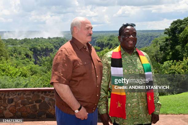 Belarus' President Alexander Lukashenko and Zimbabwean President Emmerson Mnangagwa visit the Victoria Falls on the Zambezi River, on the border with...